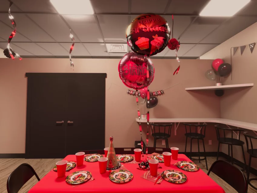 A landscape view that oversee Novus Middletown party room. Table, Chairs, Balloons, Confetti, and other red colour celebrations